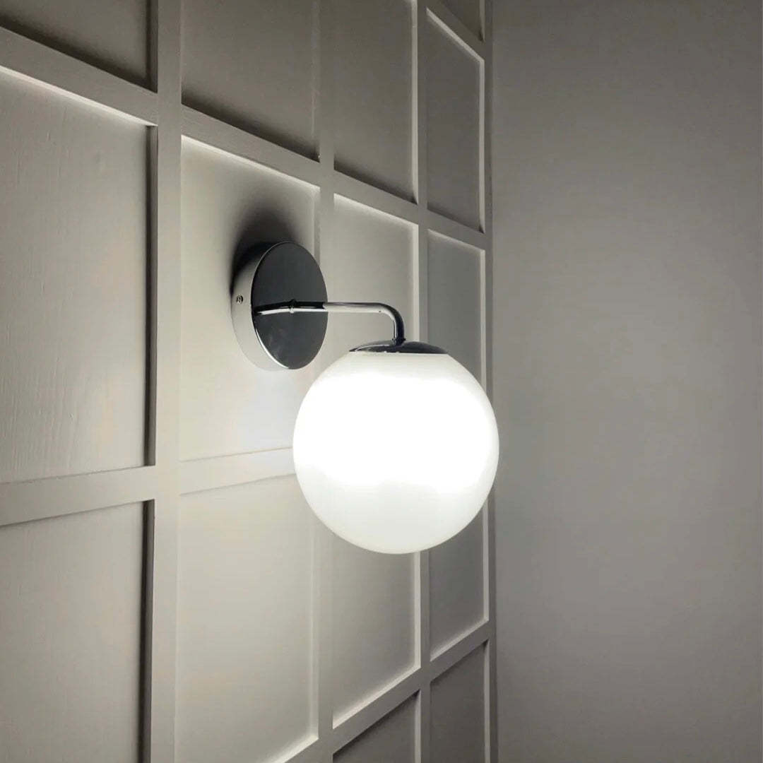 Valentina Wall Lamp illuminating a bedroom