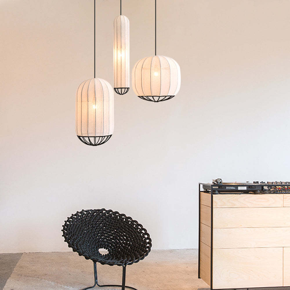 Three Renée pendant lights, fabric lamps in a modern setting