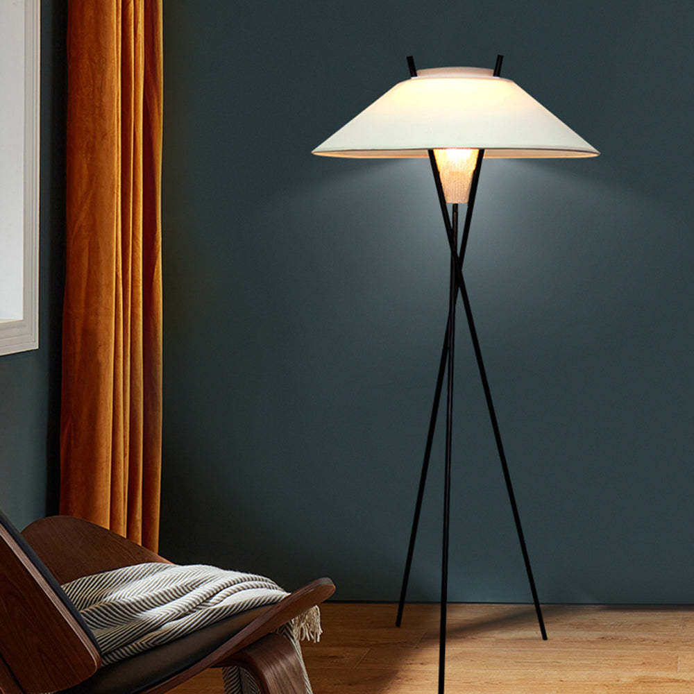 Carins Modern Tripod Floor Lamp, illuminating living room