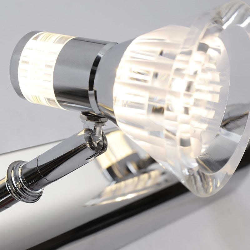 Kristy Conic wall lamp close-up, showing light and metal details