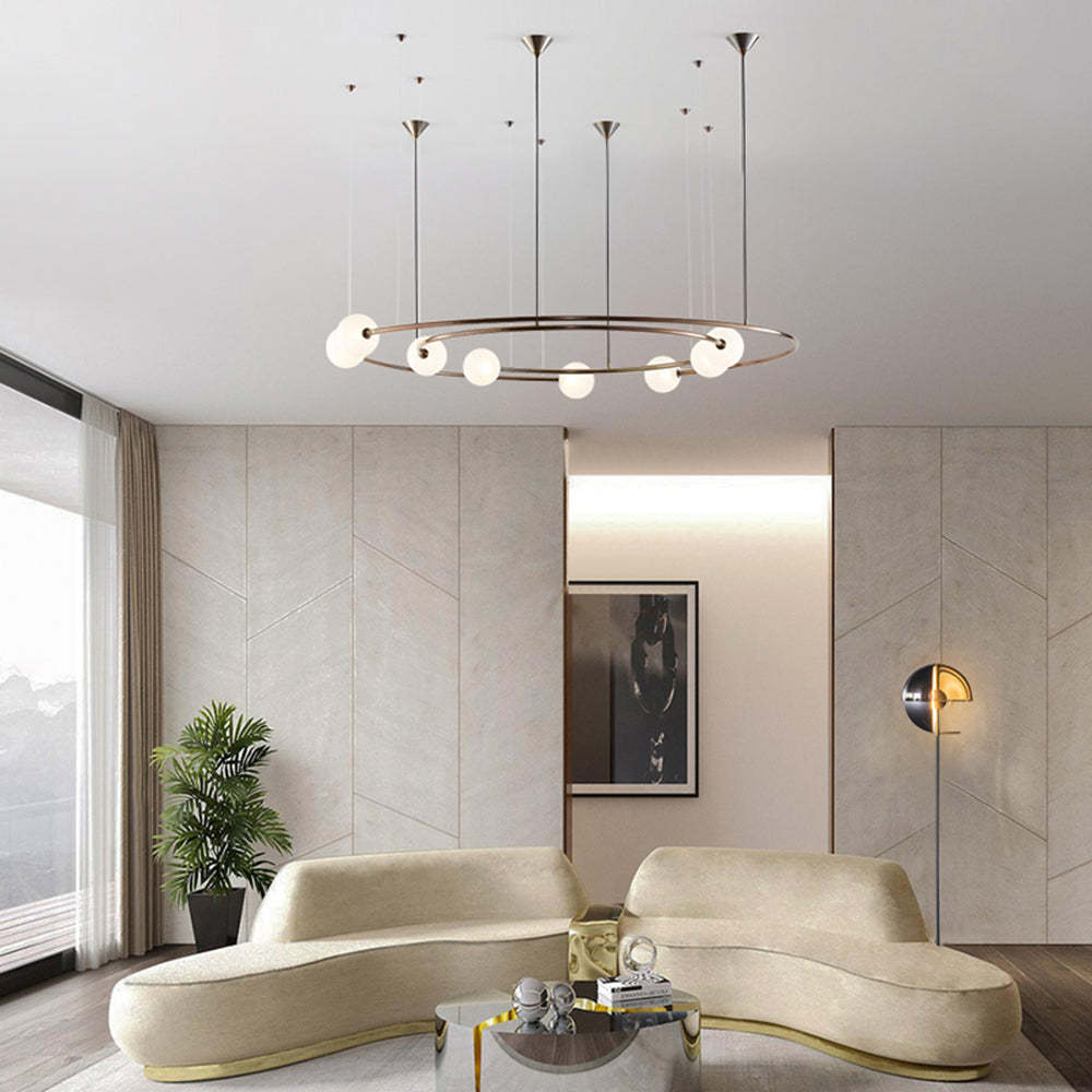 Modern living room with Valentina pendant light, featuring a ring design.