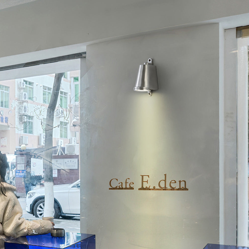 Orr metal wall lamp at Cafe E.den entrance