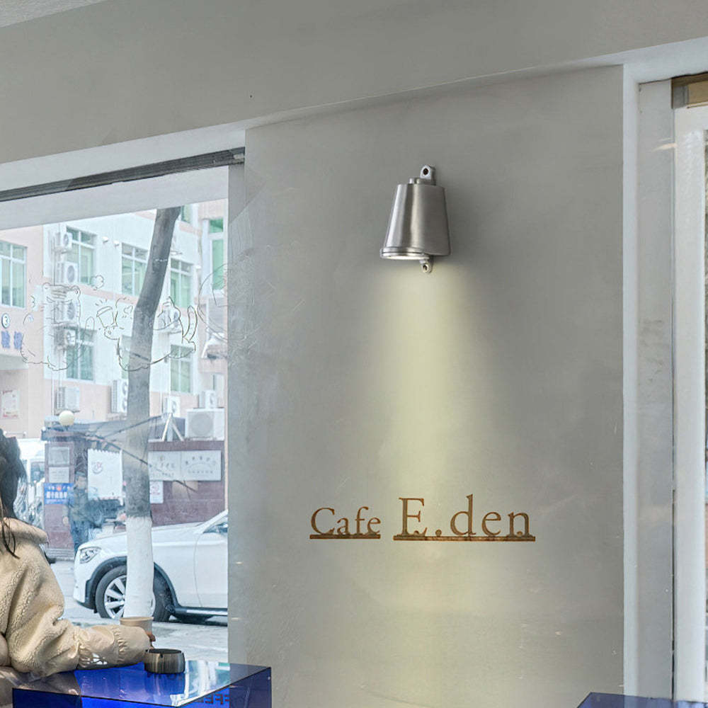 Orr metal wall lamp at Cafe E.den entrance