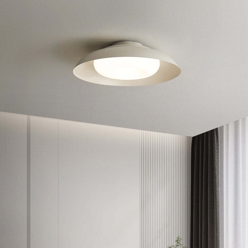 Carins Nordic flush mount ceiling light in white room.