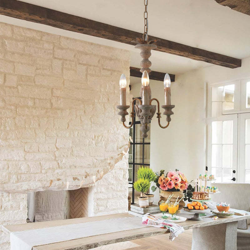 Rustic wood chandelier over dining table