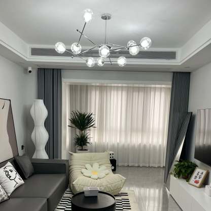 Modern Valentina LED Chandelier in a Living Room