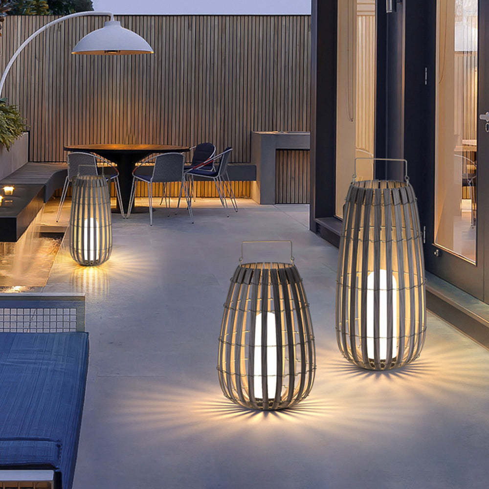 Muto Retro Lantern floor lamps illuminating outdoor patio