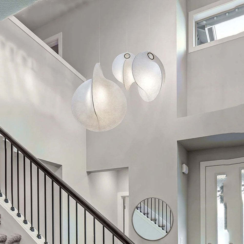 Renée pendant lights in modern stairwell, white fabric