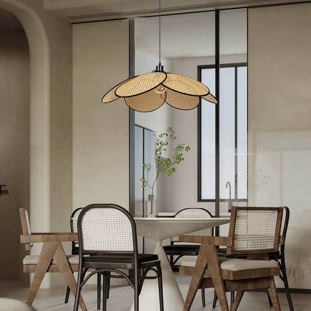 Ritta rattan pendant light above dining table