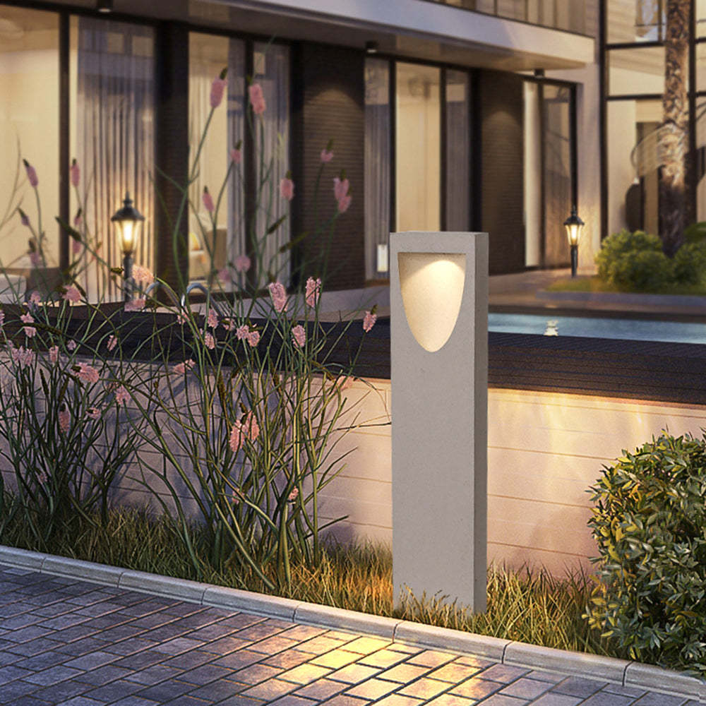 Pena Outdoor Path Light illuminating courtyard at night