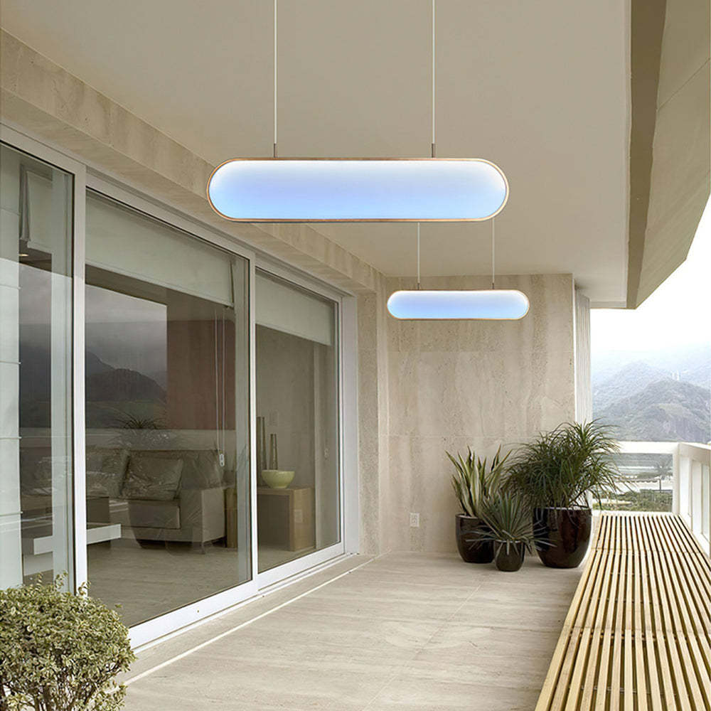Modern pendant lights illuminating a balcony
