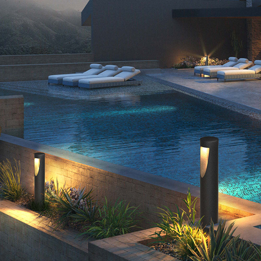 Pena Outdoor Path Light illuminating a pool area