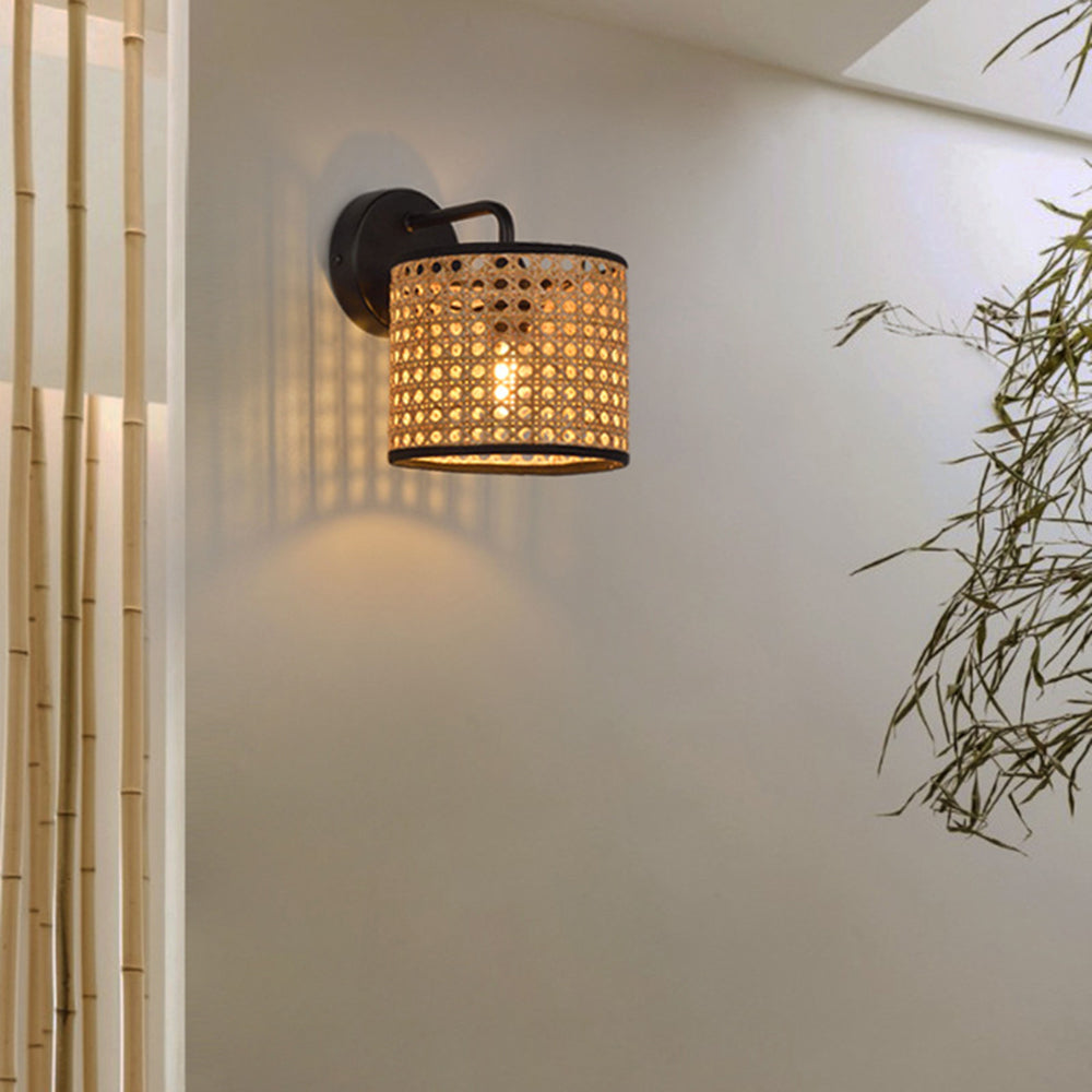 Rattan wall lamp illuminating a living space