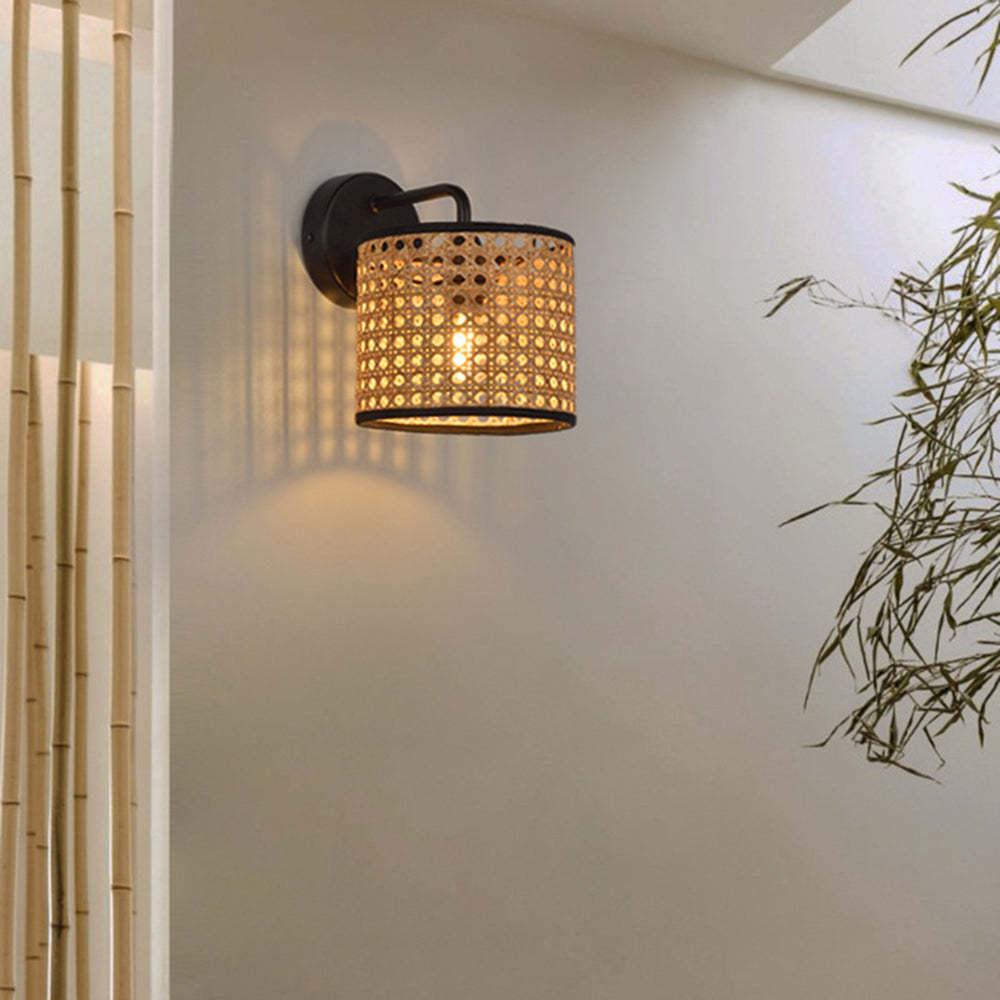 Rattan wall lamp illuminating a living space