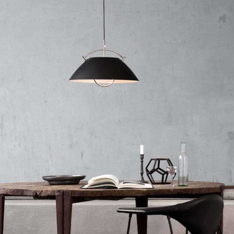 Black Cairns Nordic Pendant Light over dining table setting