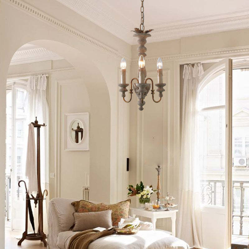 French wood chandelier in bright living room