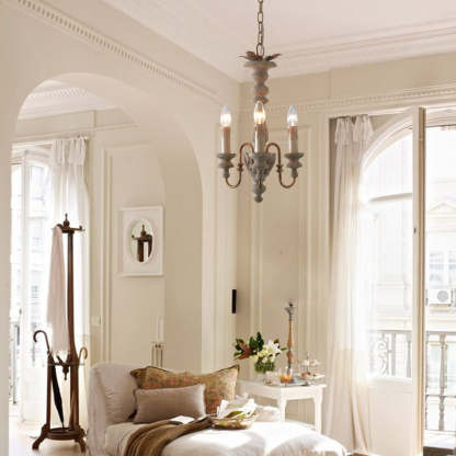 French wood chandelier in bright living room