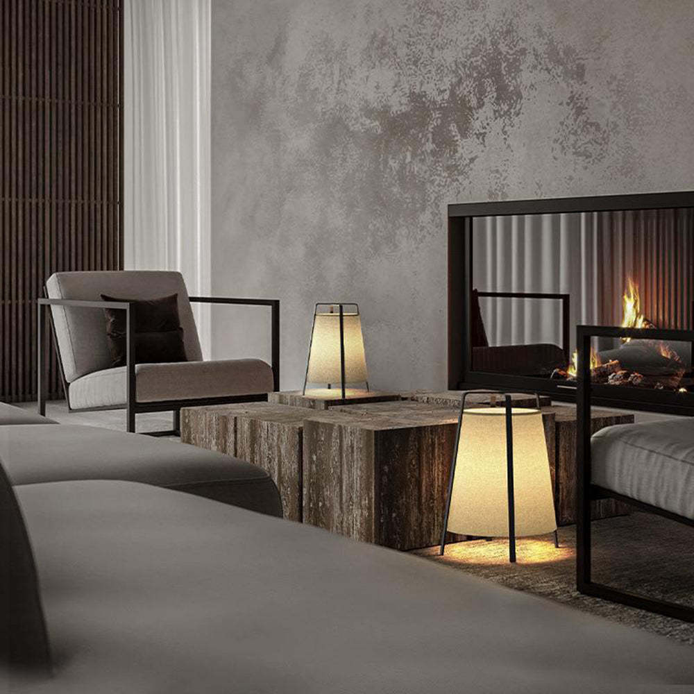 Modern living room with Renée fabric floor lamps, fireplace, and cozy seating