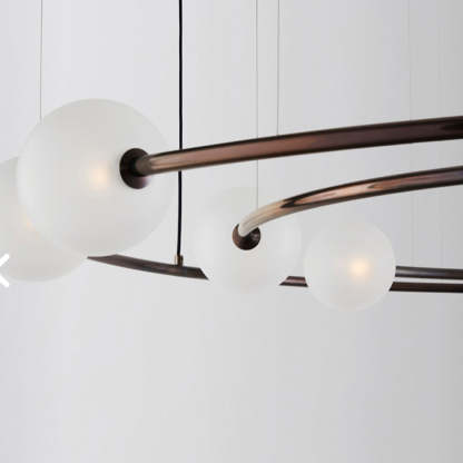 Valentina pendant light with frosted glass globes.
