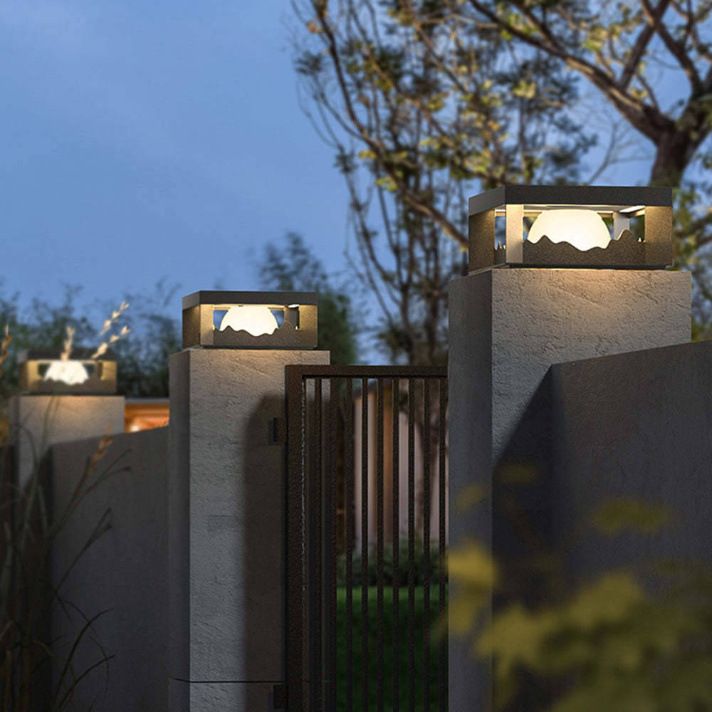Outdoor Riley metal pillar lights, warm light in garden