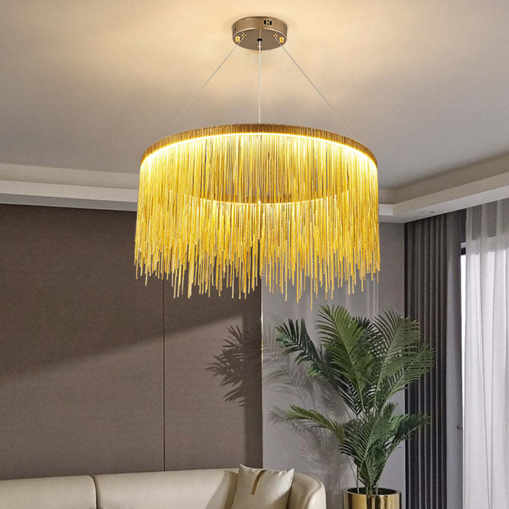 Gold tassel pendant light in a living room, Art Deco style