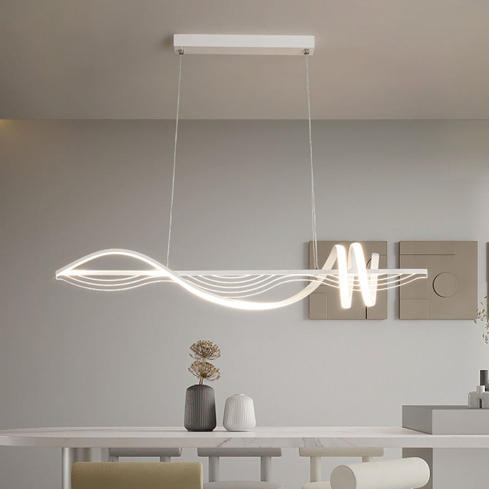 Modern white LED pendant light over dining table