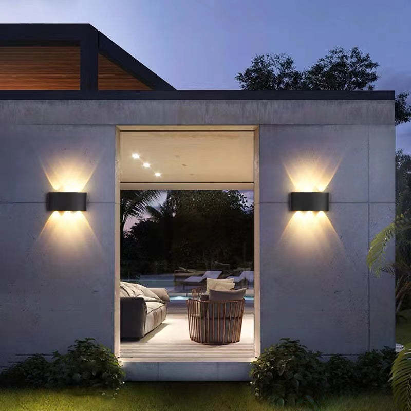Modern Metal Outdoor Wall Lamps illuminating patio