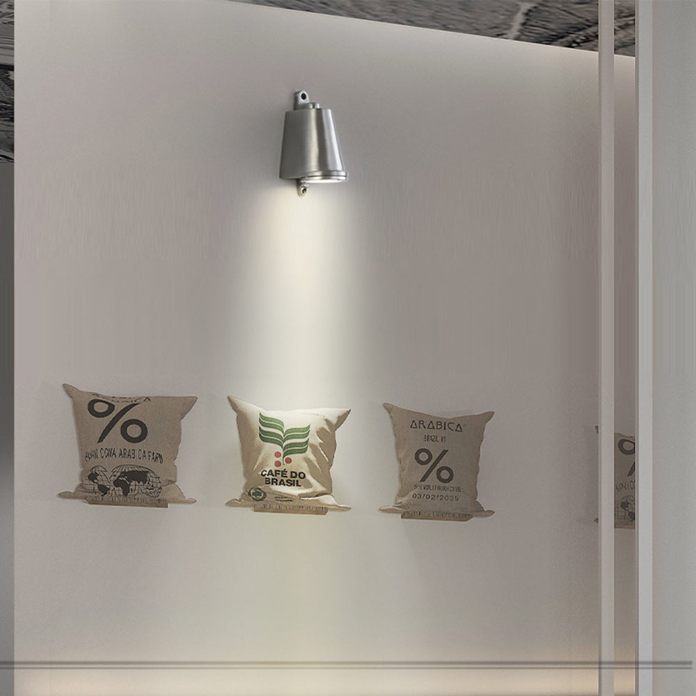 Orr metal wall lamp above coffee bean bag art.