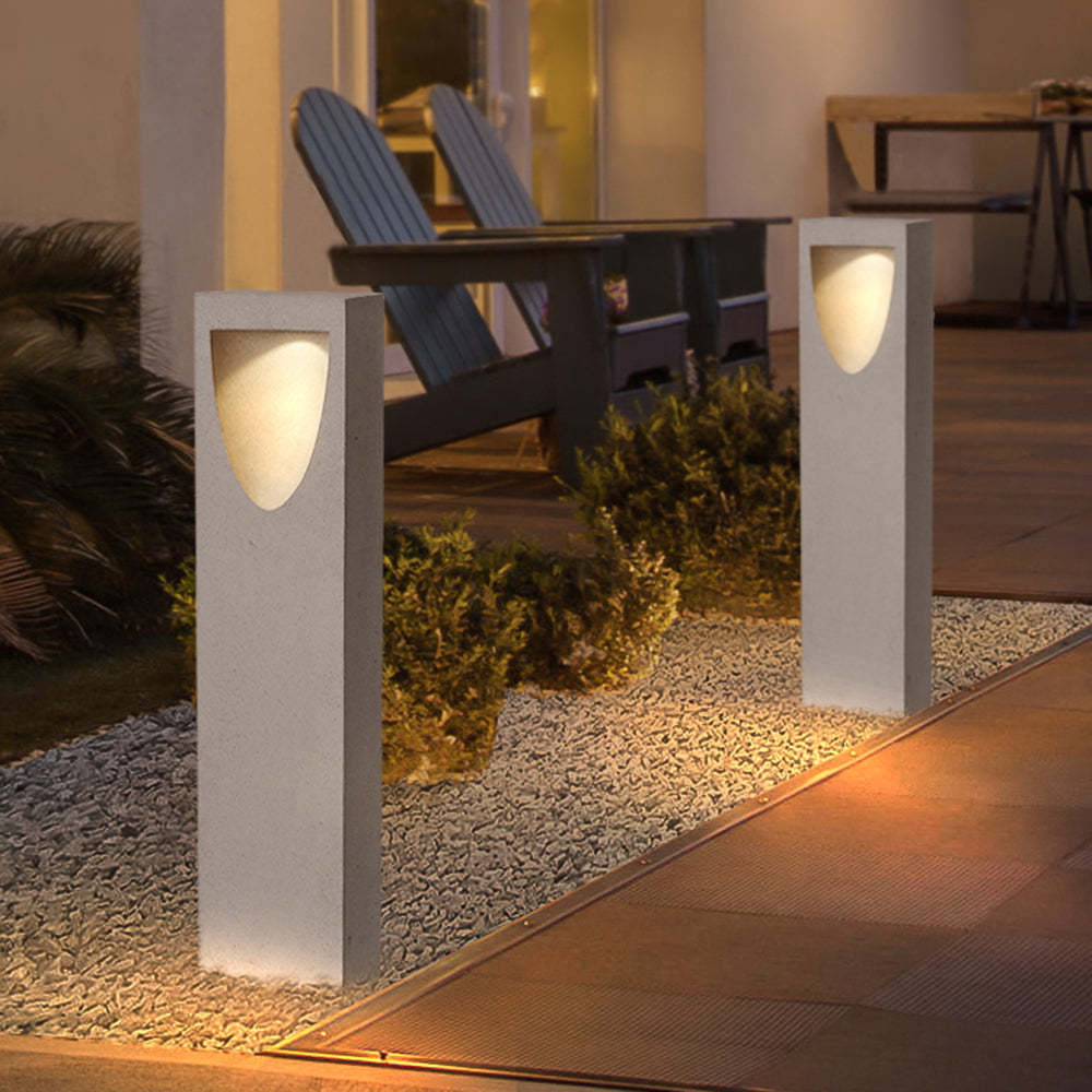 Pena Modern Outdoor Path Lights illuminating patio at night