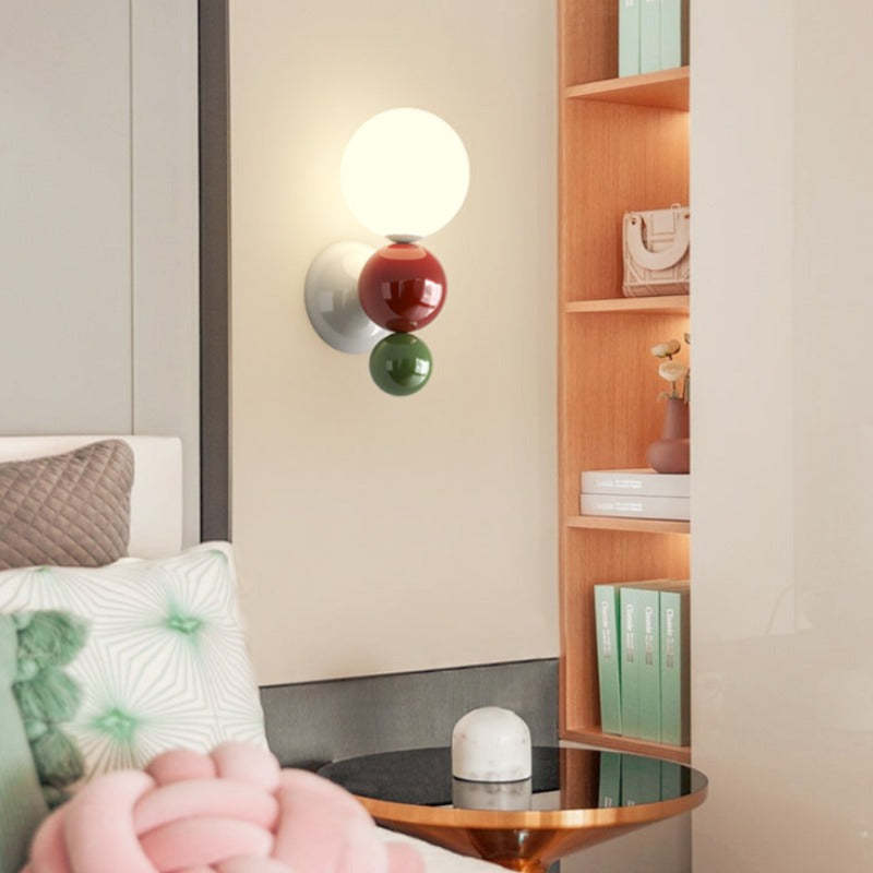 Valentina modern wall lamp in a bedroom setting, decorative lighting.