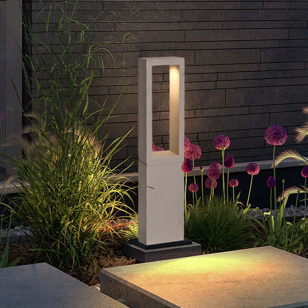 Pena Outdoor Path Light illuminating garden with modern design
