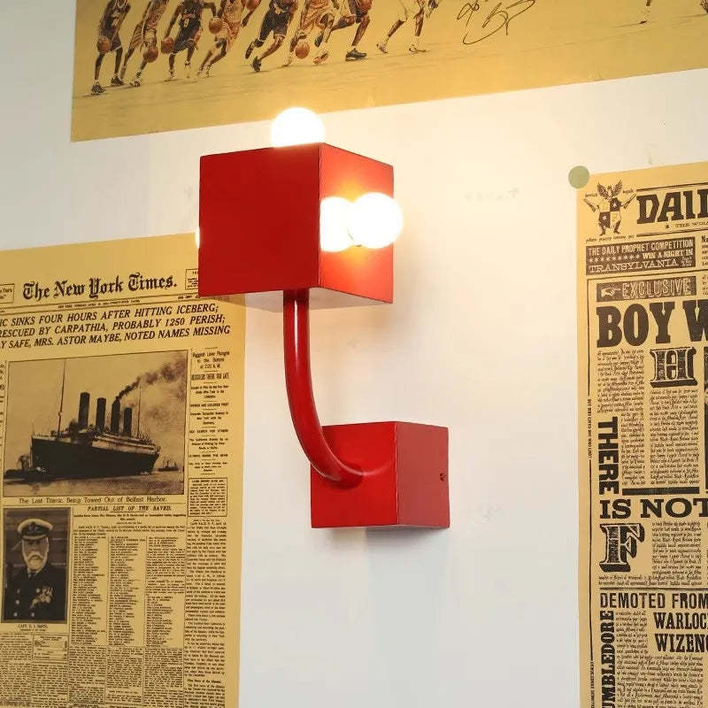 Fateh Red Wall Lamp with vintage newspaper background