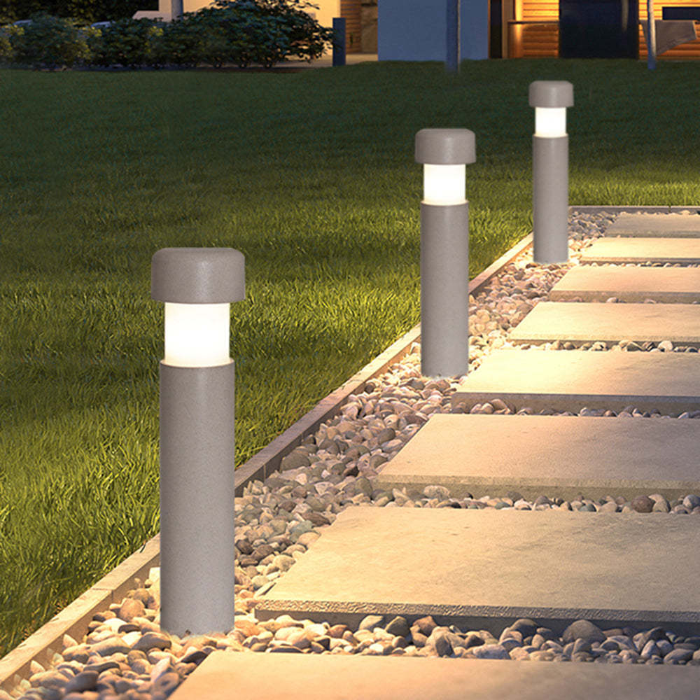 Orr modern gray outdoor path lights illuminating a garden walkway