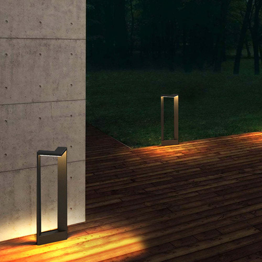 Outdoor Orr path lights illuminating a wooden deck and garden