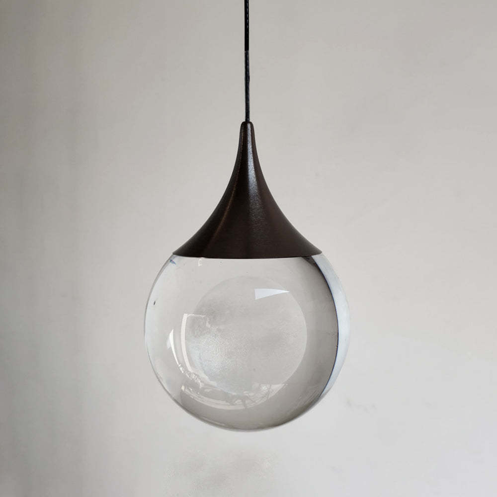 Elif Moon Pendant Light - Crystal globe and metal fixture.
