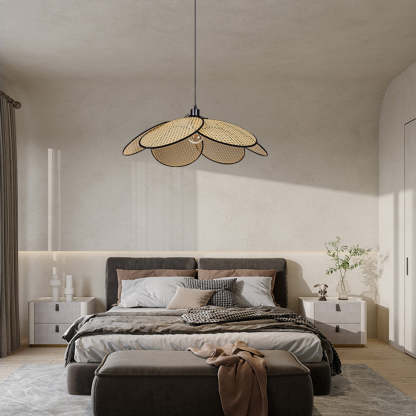 Ritta rattan pendant light in bedroom setting.