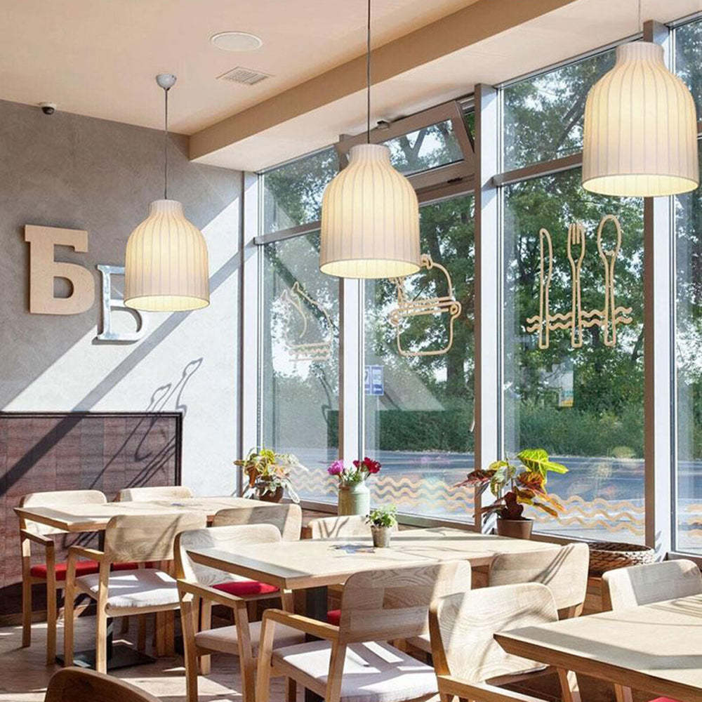 Renée pendant lights in a restaurant setting, Lassola lighting