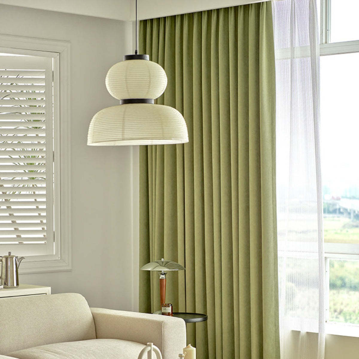 Ozawa Retro Fabric Pendant Light illuminating a living room