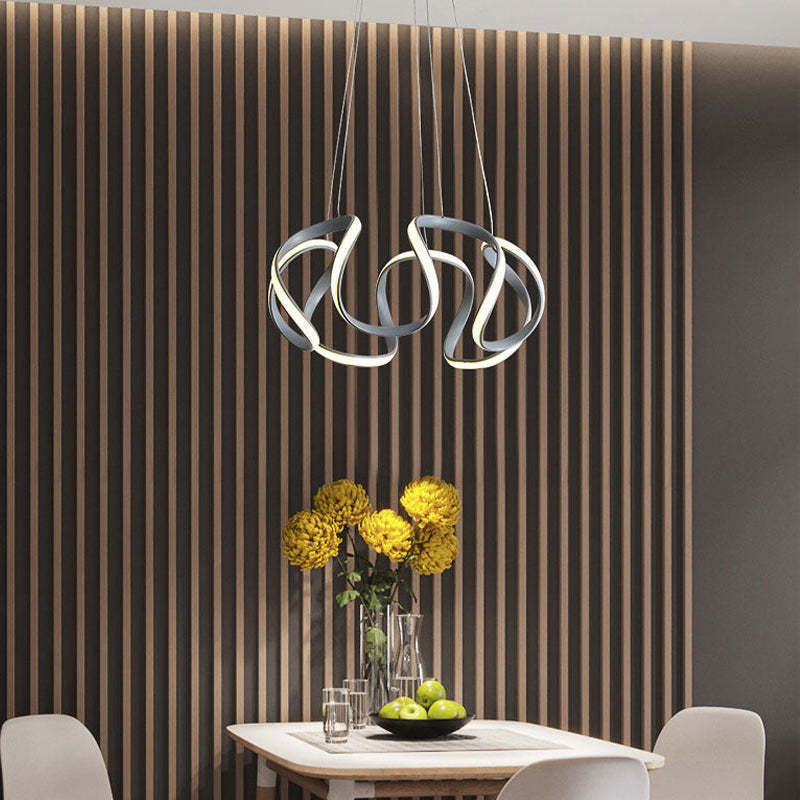 Modern gray Louise pendant light in a dining room setting.