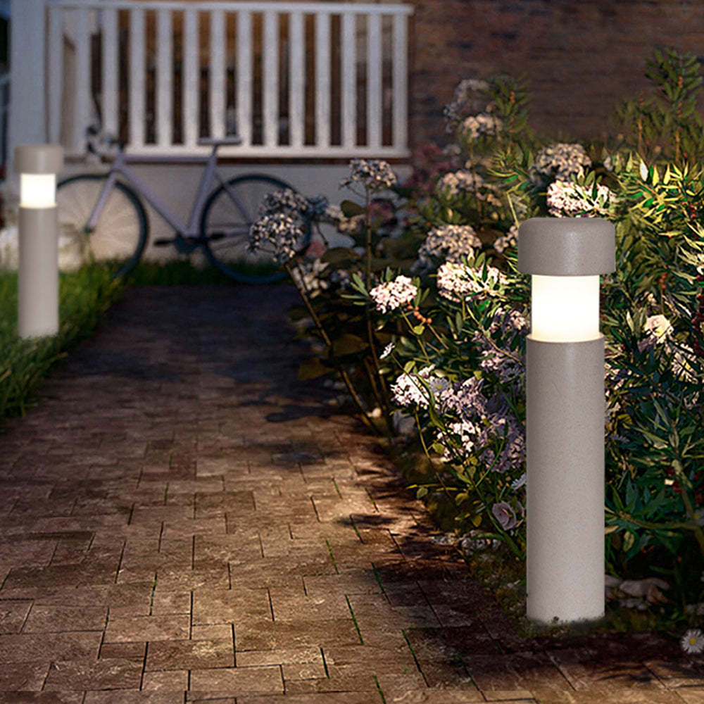 Orr Modern Outdoor Path Light illuminating garden walkway