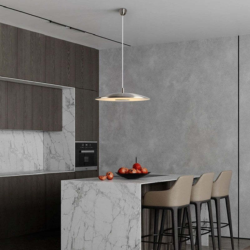 Cairns pendant light in modern kitchen with bar stools and marble island