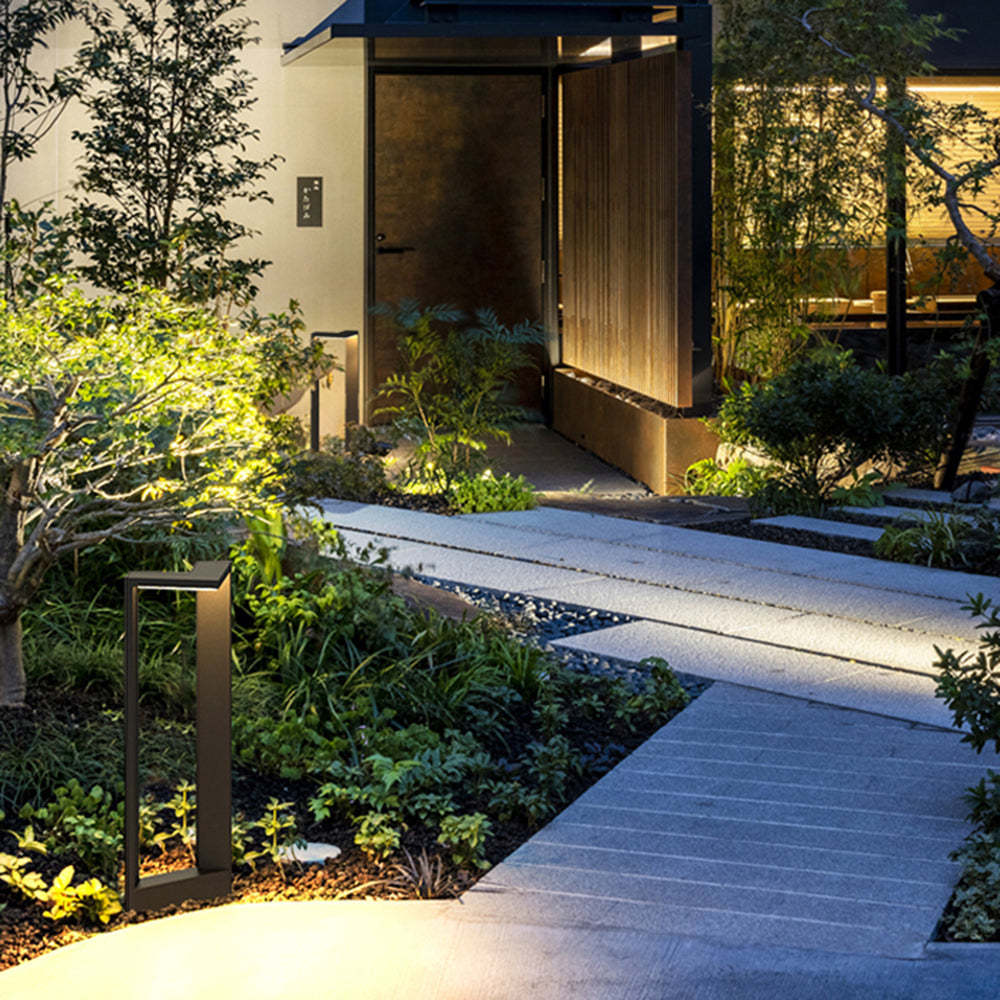 Orr right-angle outdoor path light illuminating garden pathway