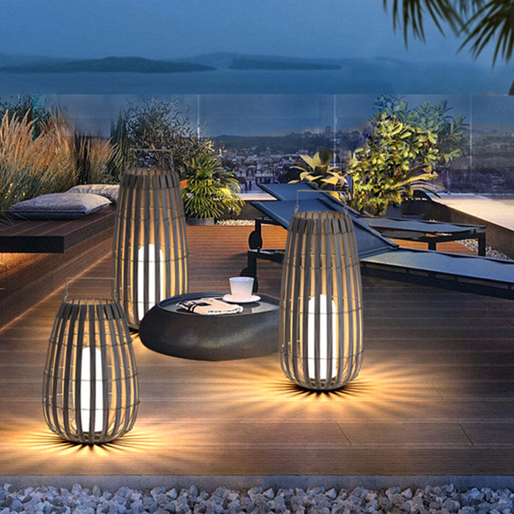 Outdoor patio illuminated by Muto Retro Lantern floor lamps