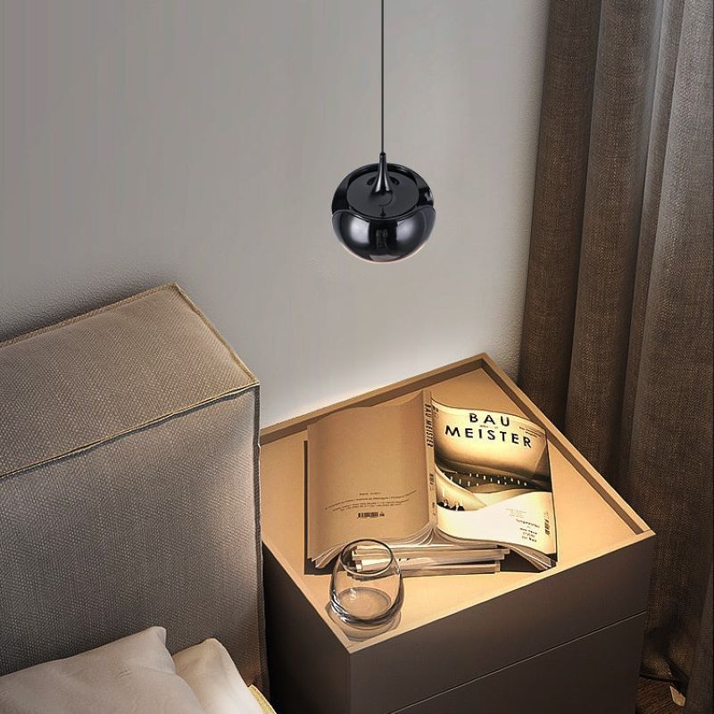 Hailie Nordic pendant light above bedroom bedside table