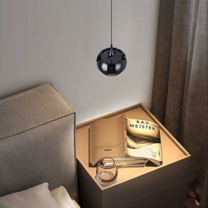 Hailie Nordic pendant light above bedroom bedside table