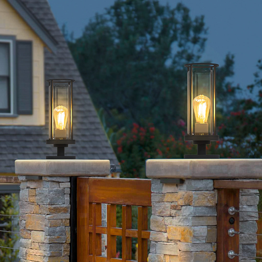 Outdoor path light illuminating a garden entrance at night