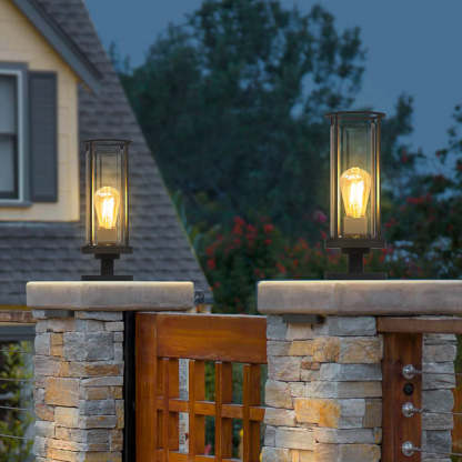 Outdoor path light illuminating a garden entrance at night