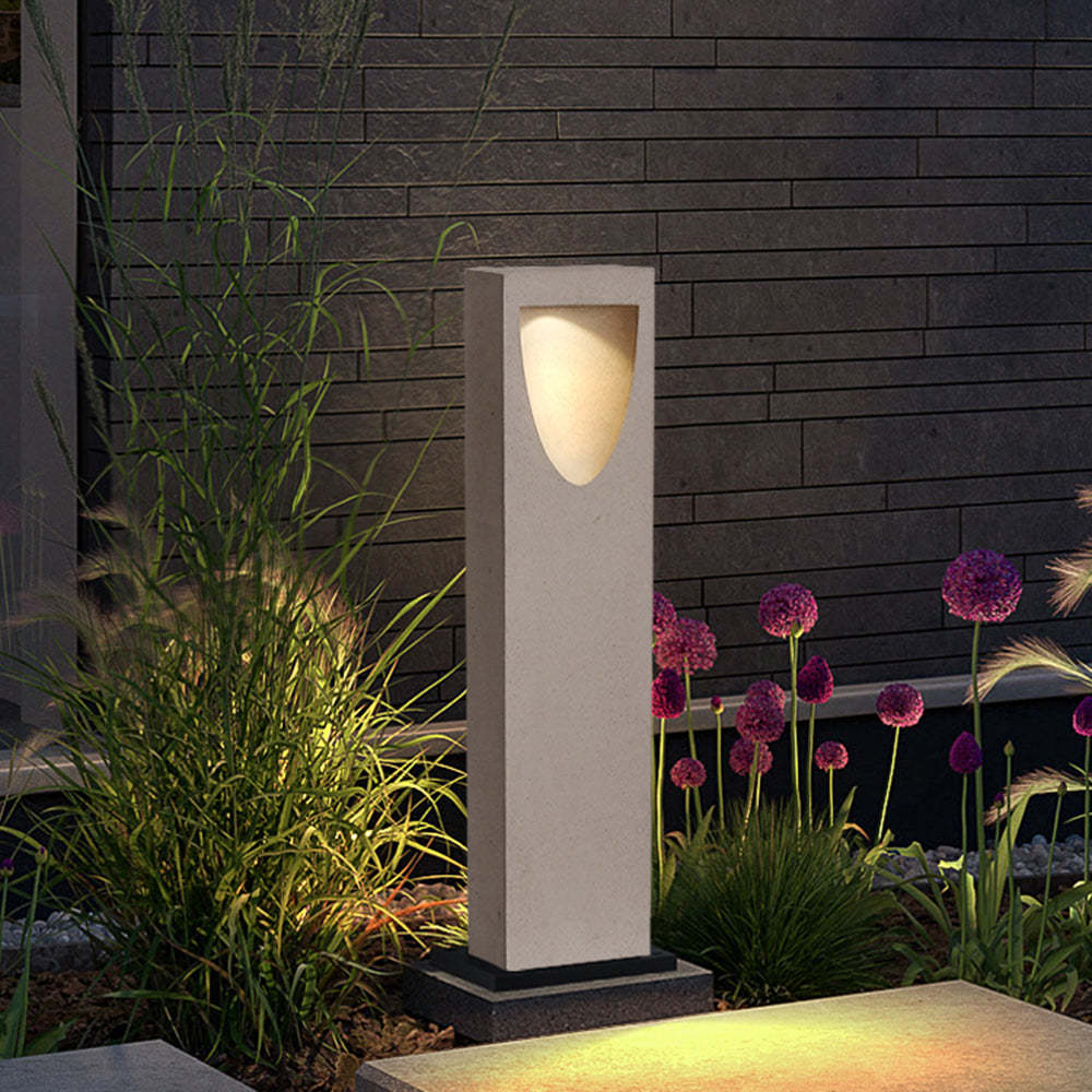 Pena Stone Path Light illuminating garden at night
