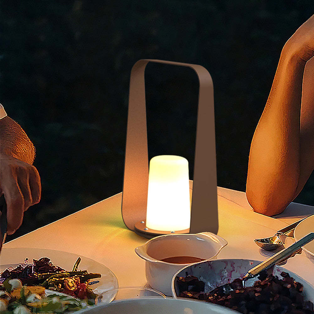 Orr portable lamp illuminating outdoor dinner table