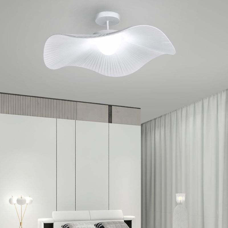 White modern flush mount ceiling light in bedroom